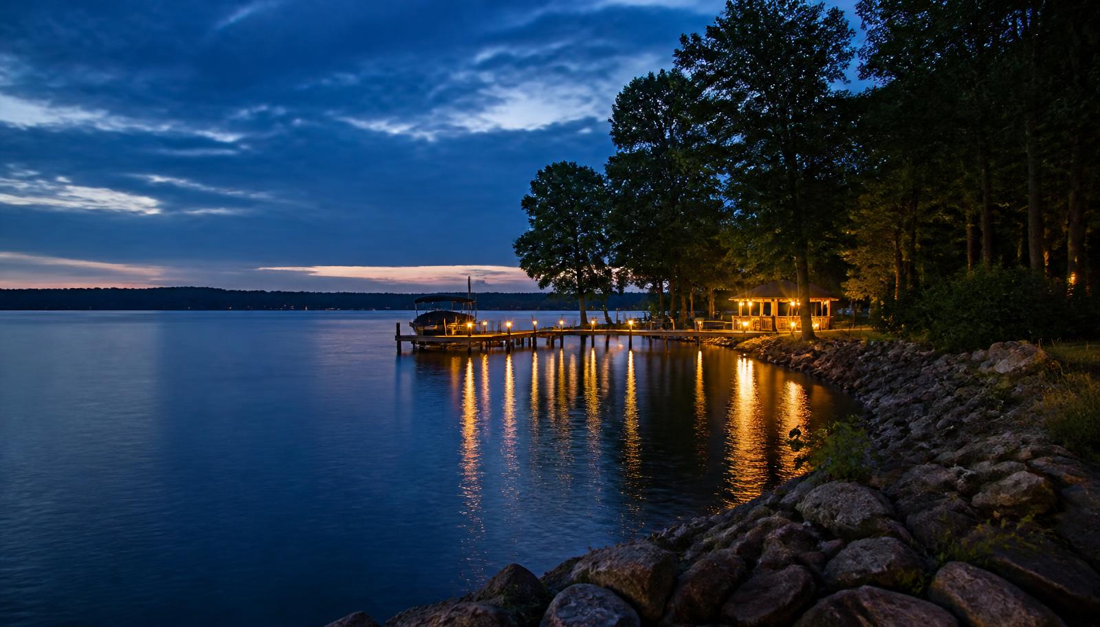 Lake Wylie shoreline at golden hour with docks and mature hardwoods